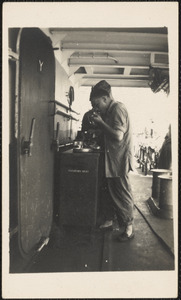 Unidentified image, probably coastguardsman on LST 795 while underway in Pacific