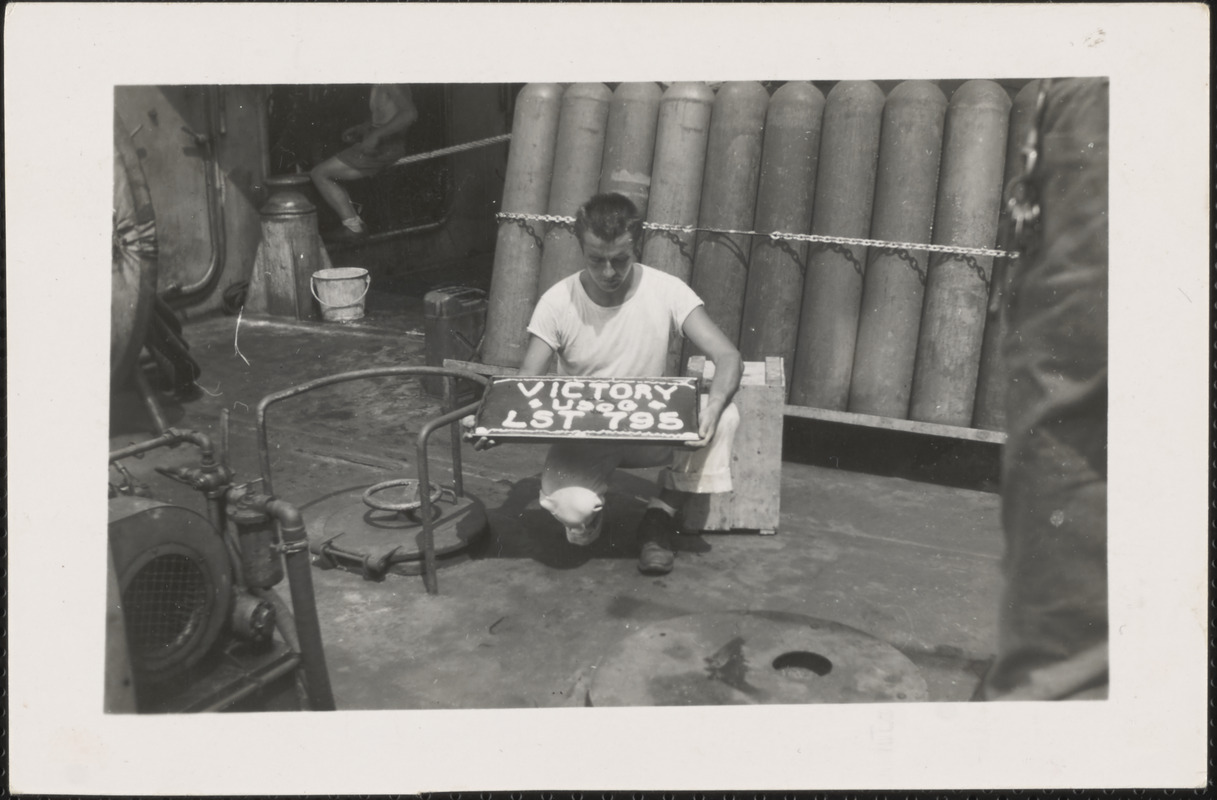 Victory cake with SC1 A. Kraft onboard LST 795