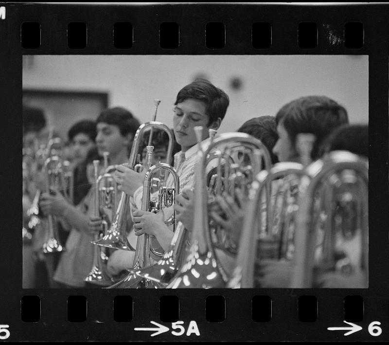 Drum-and-bugle practice in high school gym, Lynnfield