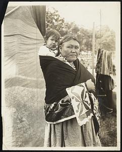 Ponca squaw ("Waving Grass") and papoose. Two of the 300 Indians with 101 Ranch Real Wild West and Great Far East. Edward Everett Square, week of June 1st