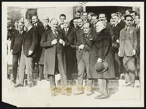 First Meeting of Lausanne Peace Conference. Left to right, Lord Curzon, Premier Benito Mussoline of Italy, and Premier Poincare of France, photographed on the steps of the conference building, following the opening session of the Near East Conference at Lausanne, Switzerland.