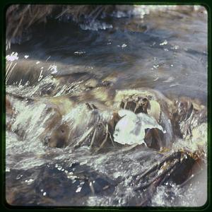 Water running through rocks