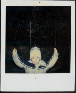 Boy with arms raised