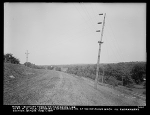 Wachusett Department, Wachusett-Sudbury power transmission line, 50-foot pull-off pole, crossing and recrossing aqueduct at sharp curve, Wachusett Aqueduct, embankment section, Berlin, Mass., Aug. 1, 1918