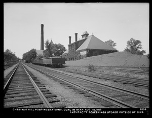 Distribution Department, Chestnut Hill Low Service and High Service Pumping Stations, coal in rear; anthracite screenings stored outside of bins, Brighton, Mass., Aug. 15, 1918