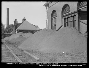 Distribution Department, Chestnut Hill Low Service and High Service Pumping Stations, coal in rear; anthracite screenings stored outside of bins, Brighton, Mass., Aug. 15, 1918