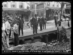 Distribution Department, Northern High Service Pipe Lines, break in 30-inch main in Cross Street; condition under Boston Elevated Railway Company's tracks, Malden, Mass., Sep. 15, 1918