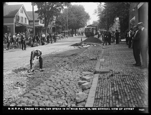 Distribution Department, Northern High Service Pipe Lines, break in 30-inch main in Cross Street, from Main Street; general view of street, Malden, Mass., Sep. 15, 1918