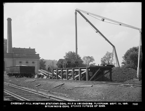 Distribution Department, Chestnut Hill Low Service and High Service Pumping Stations, coal pile and unloading platform; bituminous coal stored outside of bins, Brighton, Mass., Sep. 19, 1918