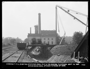 Distribution Department, Chestnut Hill Low Service and High Service Pumping Stations, coal pile and unloading platform; bituminous coal stored outside of bins, Brighton, Mass., Sep. 19, 1918