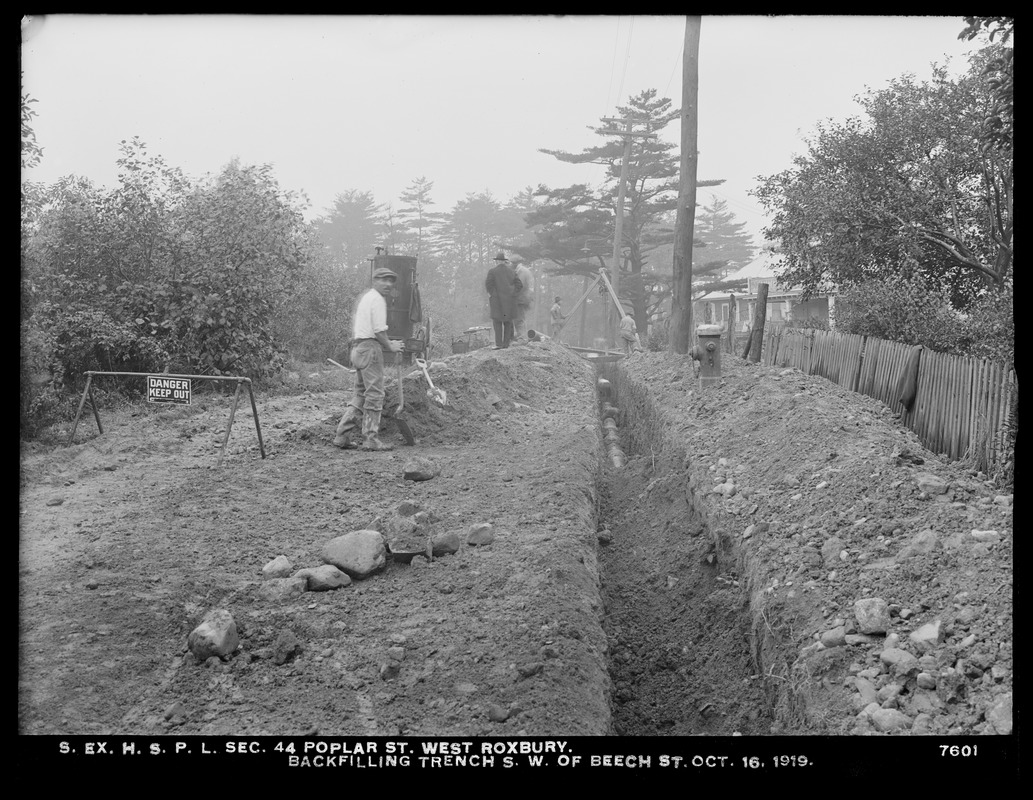 Distribution Department, Southern Extra High Service Pipe Lines, Section 44, backfilling trench in Poplar Street southwest of Beech Street, West Roxbury, Mass., Oct. 16, 1919