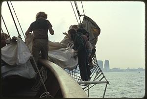 Late afternoon - return toward Boston includes furling sails