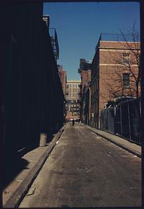 View down street of city buildings, Boston