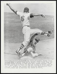 Joe Torre, Milwaukee Braves first baseman, does a ballet step as he grabs a high throw from 2nd baseman Frank Bolling as New York second baseman Chuck Miller gets back to first in the 8th inning of first game of twin bill between the Braves and Mets. Ron Swoboda, Mets left fielder, lined out to Bolling who threw to Torre.