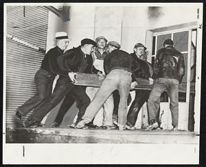 Non-strikers and farmers crash windows to rout sit-downers from Hershey chocolate factory at Hershey, Pa.