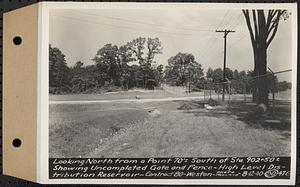 Contract No. 80, High Level Distribution Reservoir, Weston, looking north from a point 70 feet+/- of Sta. 902+50+/- showing uncompleted gate and fence, high level distribution reservoir, Weston, Mass., Aug. 12, 1940