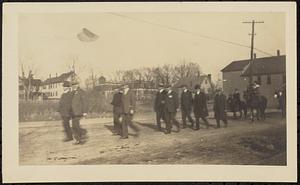 Men marching in parade