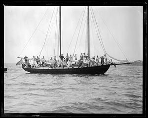 A group of people on a sailboat