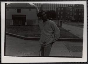 Young man posing in Newtowne Court