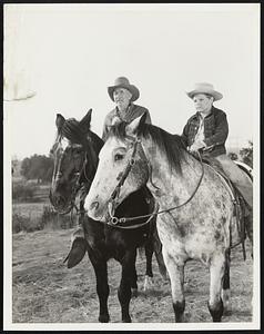 Walter Brennan Hits the Saddle Again -- This Time on TV. Three-time "Oscar" winner Walter Brennan saddles up again, this time for an infrequent TV appearance, when he stars as "The Brush Roper" under Stuart Heisler's direction on Screen Directors Playhouse Wednesday, November 23, at 8 P.M. (EST) over the NBC-TV network. Brennan portrays a doughty old cowhand who shows younger cowboys what it is to be a champion roper when danger threatens. He is shown above in a scene from the drama with 11-year-old Lee Aaker, "Rin Tin Tin" star and a four-year acting veteran, who plays Brennan's grandson. "The Brush Roper" will also be seen in the following cities on this schedule: