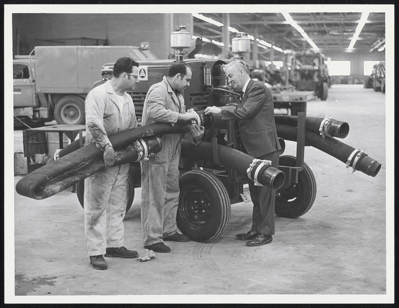 At Public works garage in Wellesley 128t Rt 9. Tony Cipulla, Charles J Lavenia. John A Cannon Supervisor of garage with waterpump