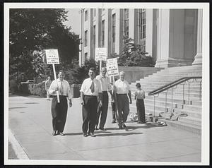 Pickets Patrolling Main Building of M.I.T. at 77 Massachusetts Ave., Cambridge, in strike which yesterday kept more than 1700 workers off their jobs at the institute and its Lincoln Laboratory in Lincoln-Lexington.