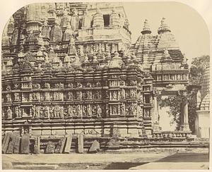 Close view showing mouldings and sculptural details on the façade of the Parsvanatha Temple, Khajuraho