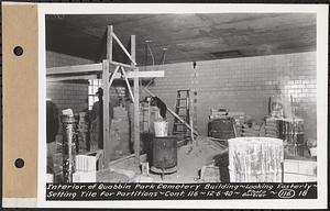 Contract No. 116, Quabbin Park Cemetery Building, Ware, interior of Quabbin Park Cemetery building, looking easterly, setting tile for partition, Ware, Mass., Dec. 6, 1940