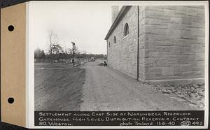 Contract No. 80, High Level Distribution Reservoir, Weston, settlement along east side of Norumbega Reservoir gatehouse, high level distribution reservoir, Weston, Mass., Nov. 6, 1940