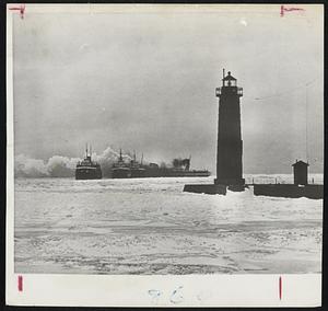 Ships Caught in Ice Field - Three Grand Trunk Pennsylvania car ferries and the Milwaukee Clipper are shown struggling free of binding ice fields outside Muskegon, Mich., harbor. They are reported safe in port now.