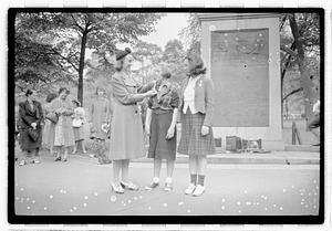 Two girls having medals pinned on them, Boston Common
