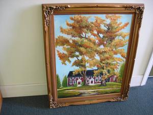 Two large trees with fall foliage in foreground