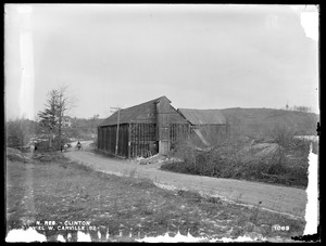 Wachusett Reservoir, Daniel W. Carville's icehouse, on the east side of the road, from the south near the road, Clinton, Mass., Jan. 27, 1897