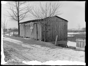 Wachusett Reservoir, Joseph F. McDonald's barn, on the west side of Main Street, from the northeast in Main Street, Clinton, Mass., Feb. 11, 1897