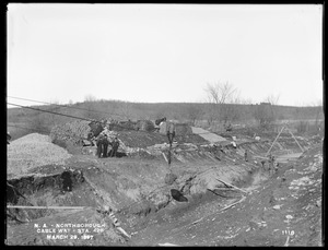 Wachusett Aqueduct, cableway and piles of bricks, Section 10, station 428, from the southwest, Northborough, Mass., Mar. 29, 1897