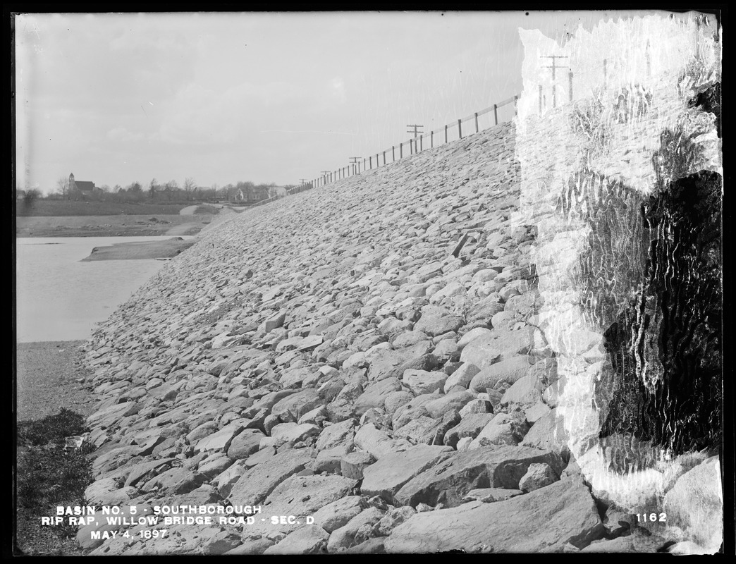 Sudbury Reservoir, Section D, riprap on the southerly side of the Willow Bridge Road, from the east at the foot of slope, Southborough, Mass., May 4, 1897