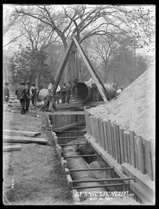 Distribution Department, Low Service Pipe Lines, Section 11, trench work on Cambridge Common, station 231+ (48-inch pipe), from the south, Cambridge, Mass., May 10, 1897