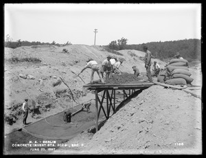 Wachusett Aqueduct, putting in concrete invert, Section 5, station 202+, from the south, Berlin, Mass., Jun. 28, 1897