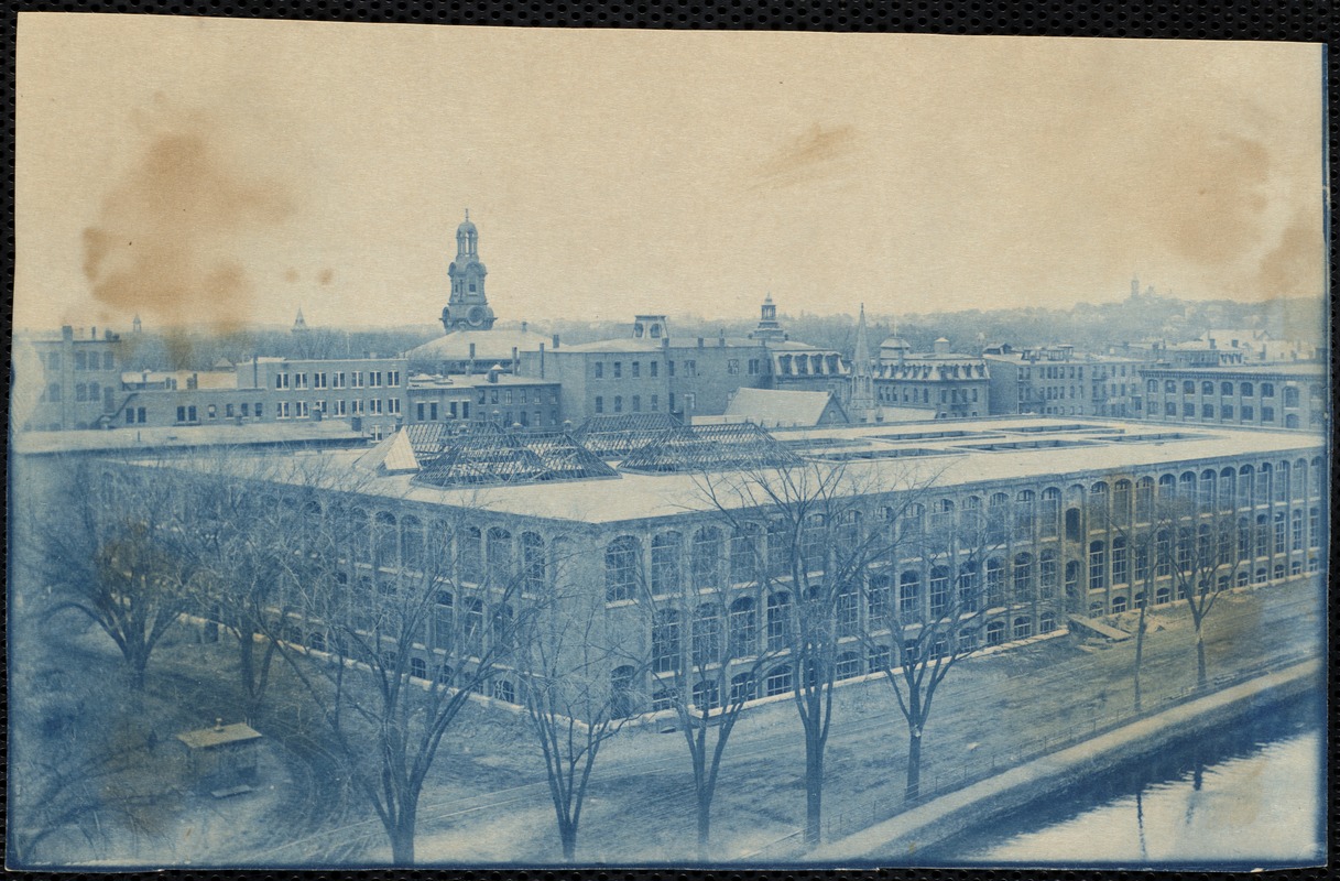 Construction of skylights atop Lower Pacific Mills weaving building