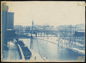 Construction of overhead connector from main building to new weaving building, view from Lower Pacific Mills