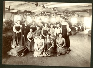 Women workers posing by the satinet machines in the Taft or 'Old Huguenot Mill approximately 1880.