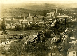 Aerial view of town of Southbridge, MA and the American Optical Company from Notre Dame Church during construction
