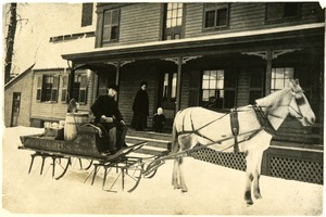 Felix Gatineau on sleigh delivering goods for P. H. Carpenter & Co.