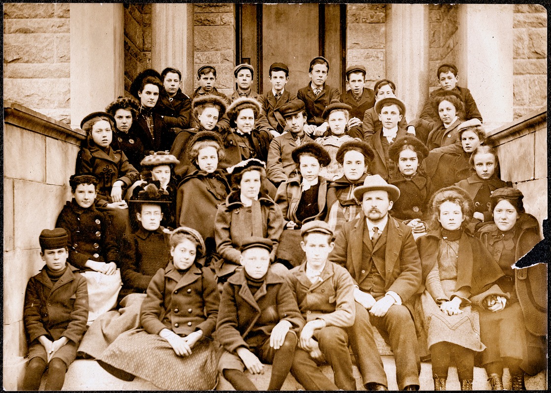 Group [A.O.C.?] portrait on Meekins Library steps, 1900