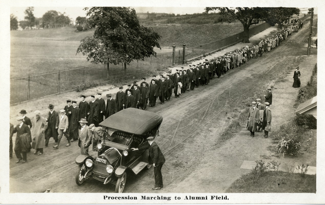 Procession marching to Alumni Field