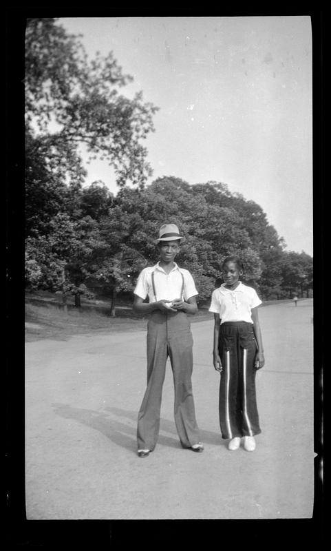 A young man and woman standing