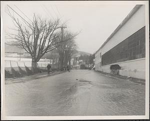 Exterior flood water, people in background