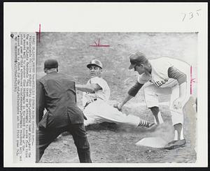 Phillies Pitcher Doing Catcher Duty -- Philadelphia Phillies pitcher Chris Short, covering home plate, puts the tag on St. Louis Cardinals Dick Groat as he attempts to score from third on passed ball to catcher Clay Dalrymple in the third inning of the second game of this afternoons double-header. Dalrymple recovered ball and tossed back to Short for the out. Philadelphia won the first game 7-3.