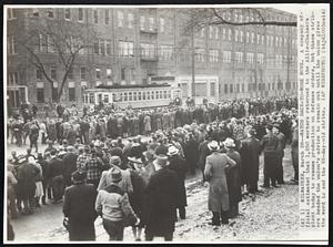 Milwaukee --Watch Back-To-Work Move. A company official estimated that 1,250 workers returned to the Allis-Chalmers plant today to resume production on defense orders, but these strikers heeded the union's advice to remain out until the union gives the word to end the 65-day-old strike.