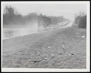 Beer Cans and Bottles tossed out of automobile windows by motorists and their passengers, such as these alongside the Newburyport Expressway in Topsfield, indicate there is more drinking taking place in cars today.